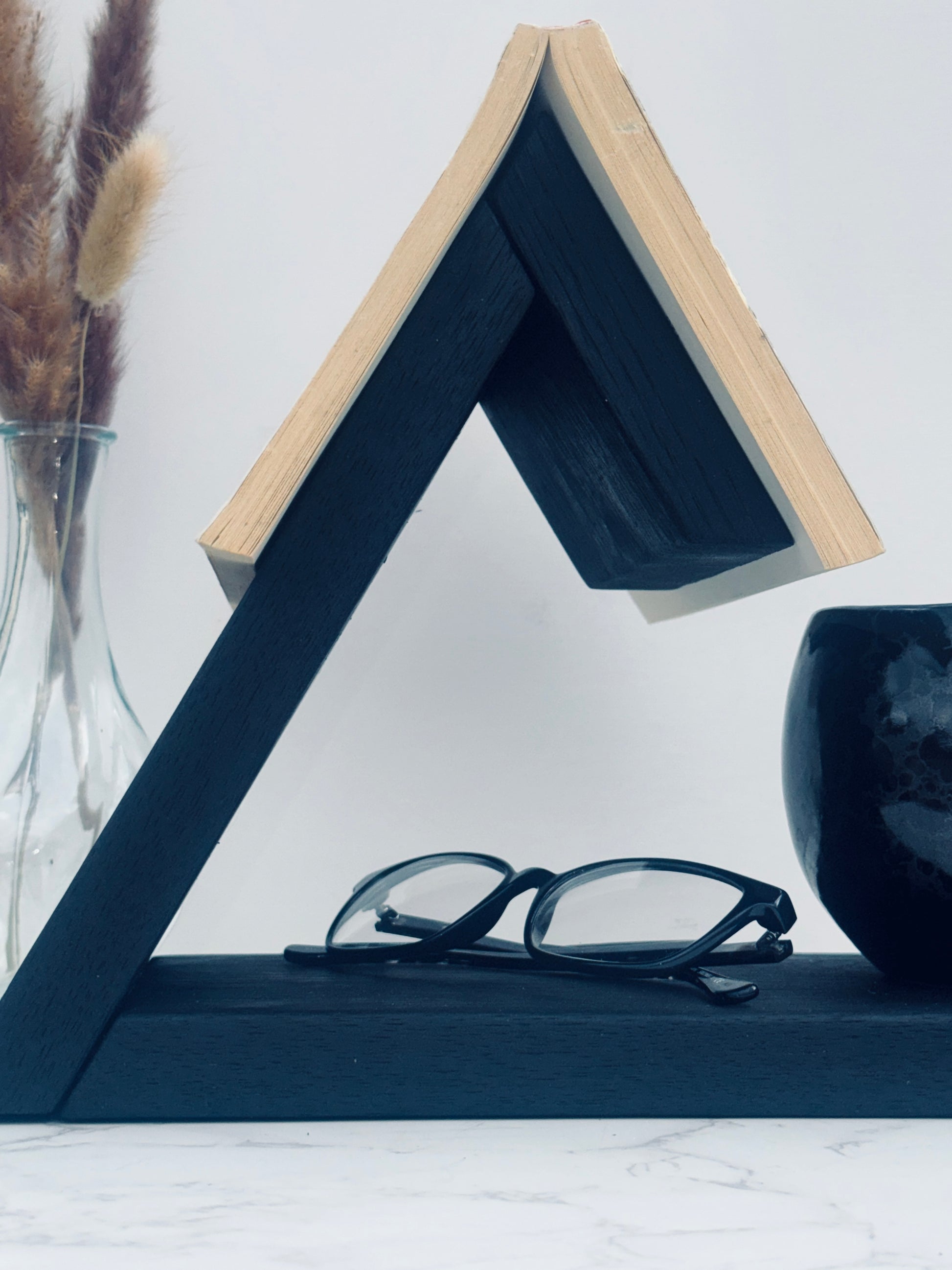 Staged book rest, image taken from the side